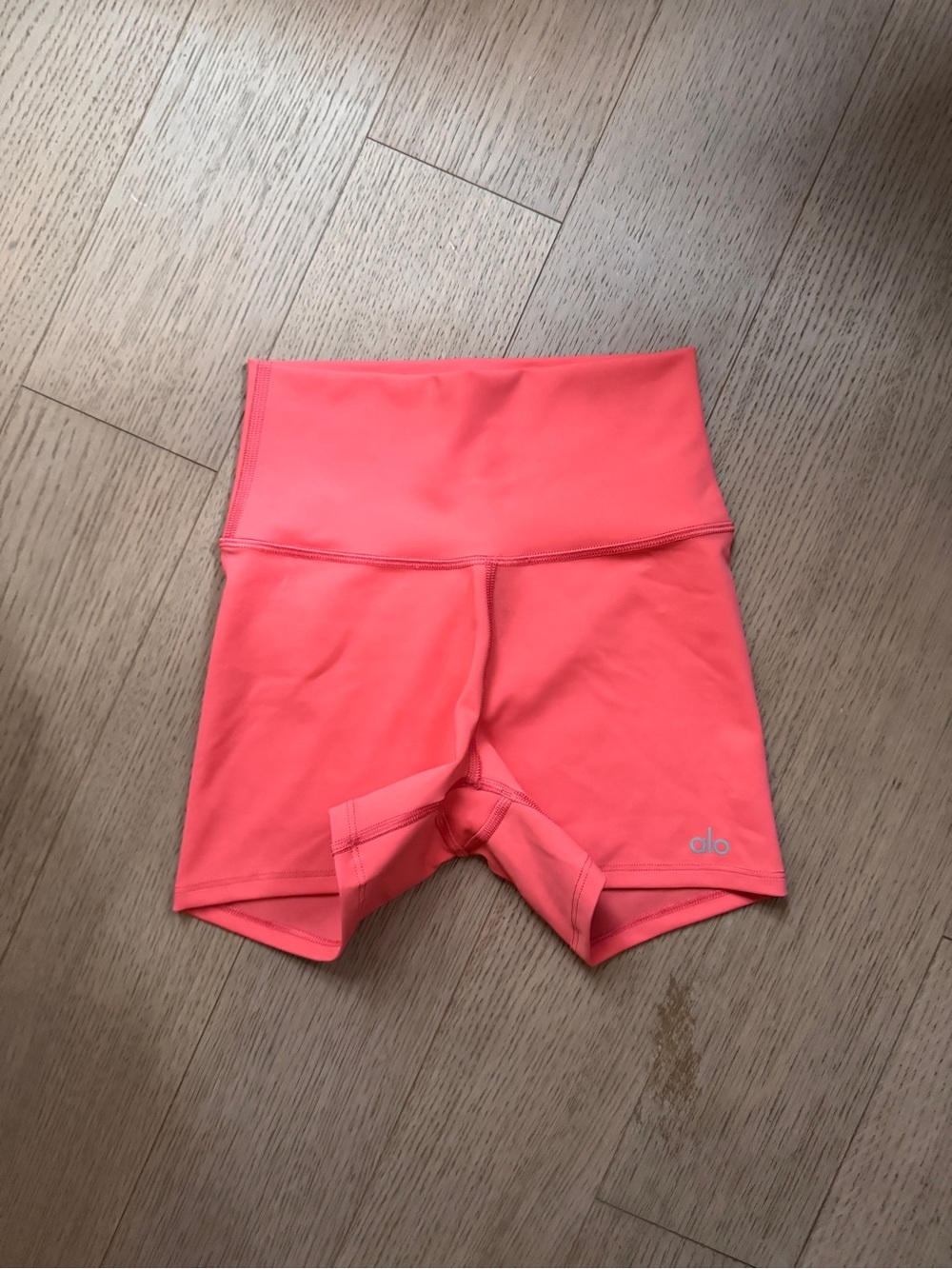 ALO Yoga High-Waist Bike Shorts in Coral Pink
